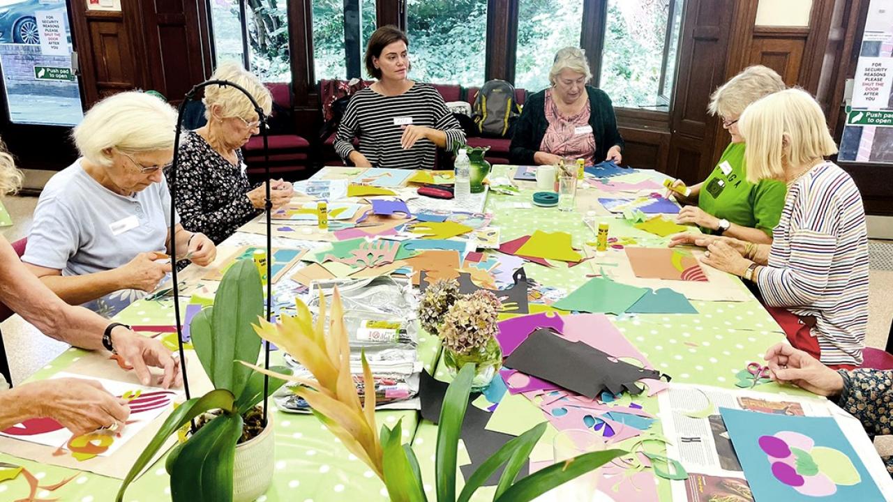 Art group around table at work
