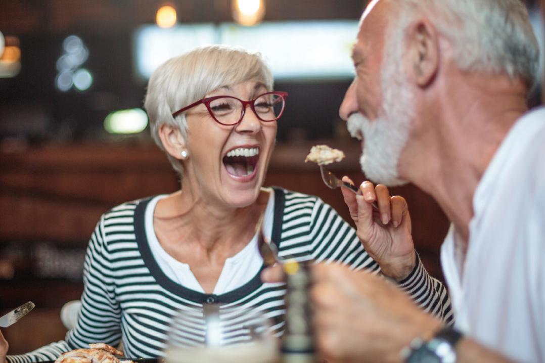 Laughing at the dinner table