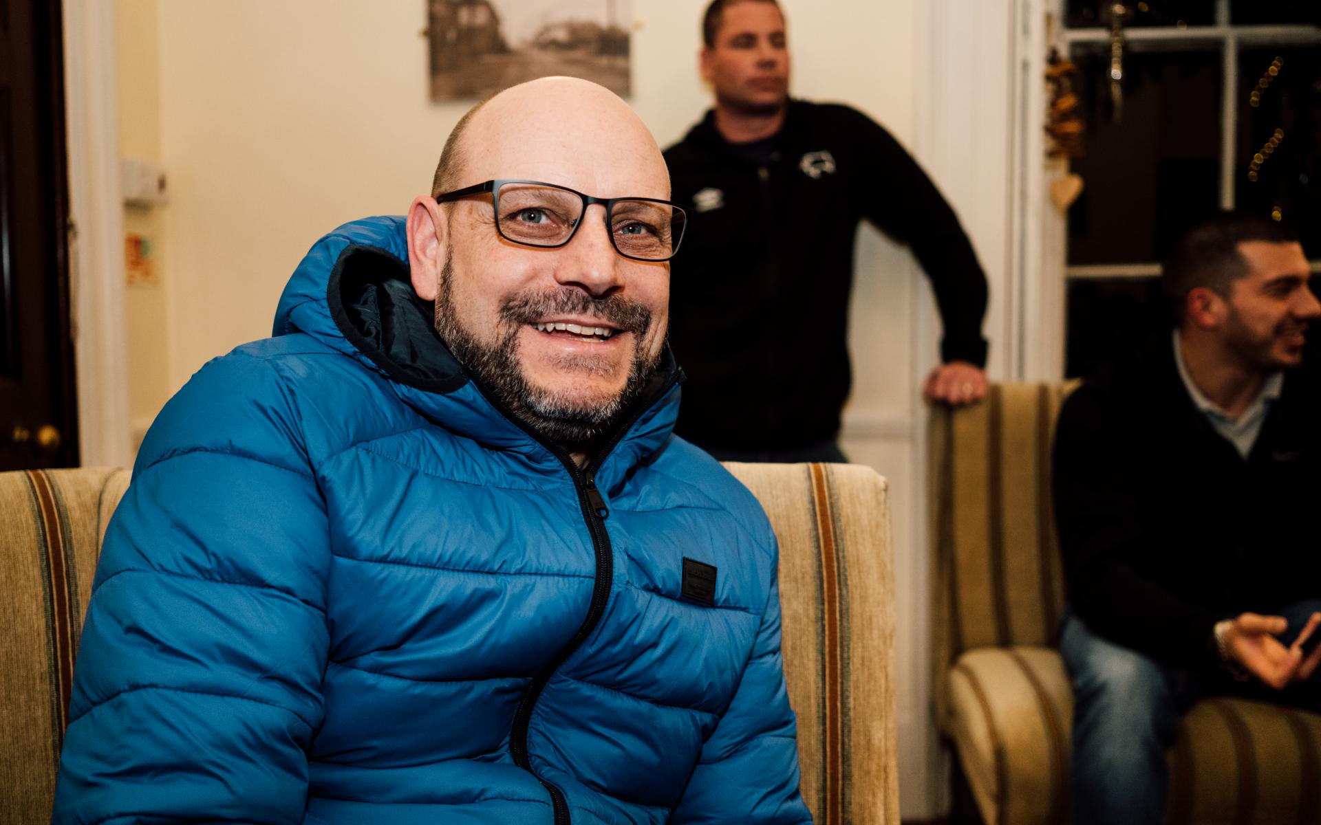 Man smiling.
