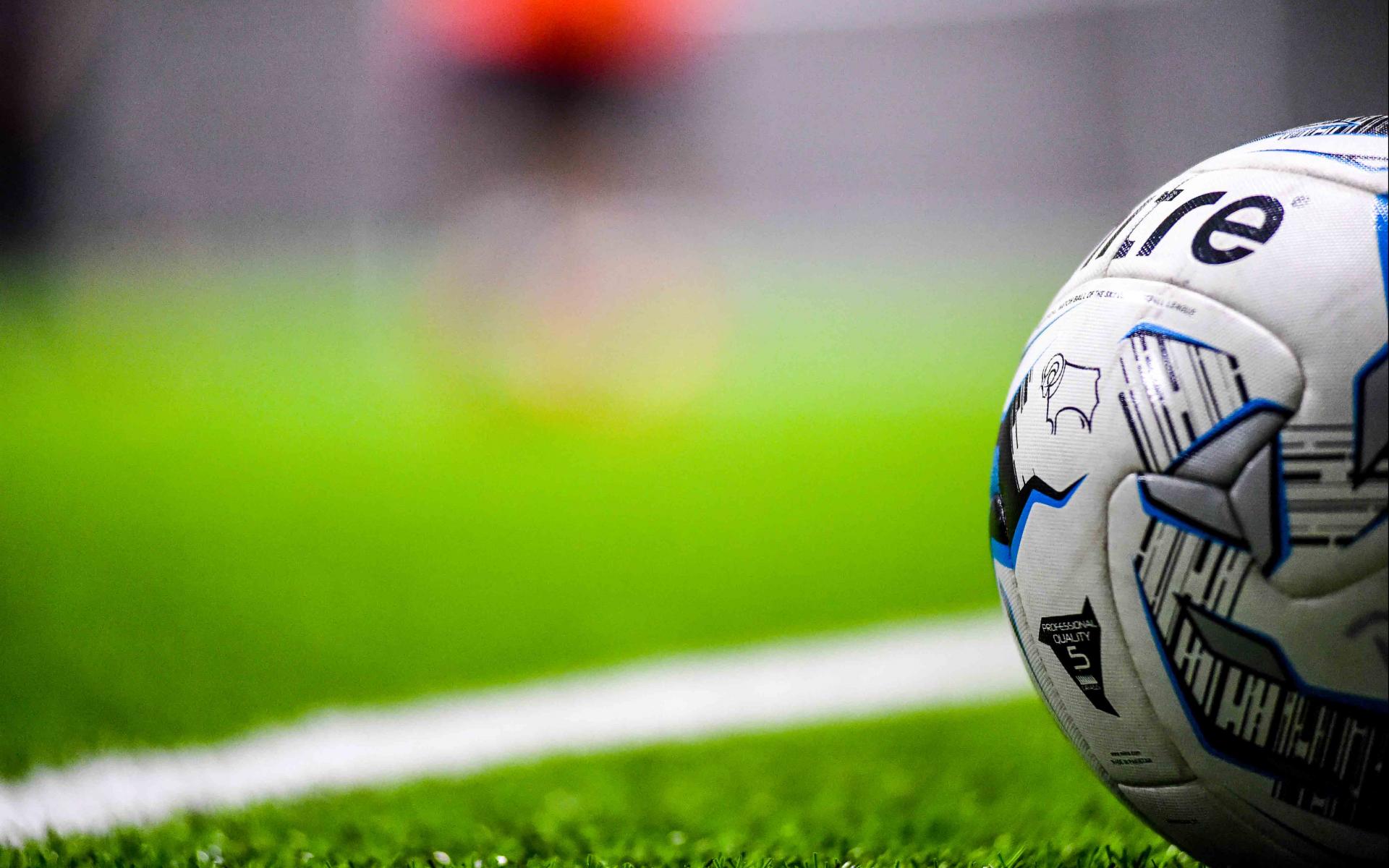 Football on a pitch. 