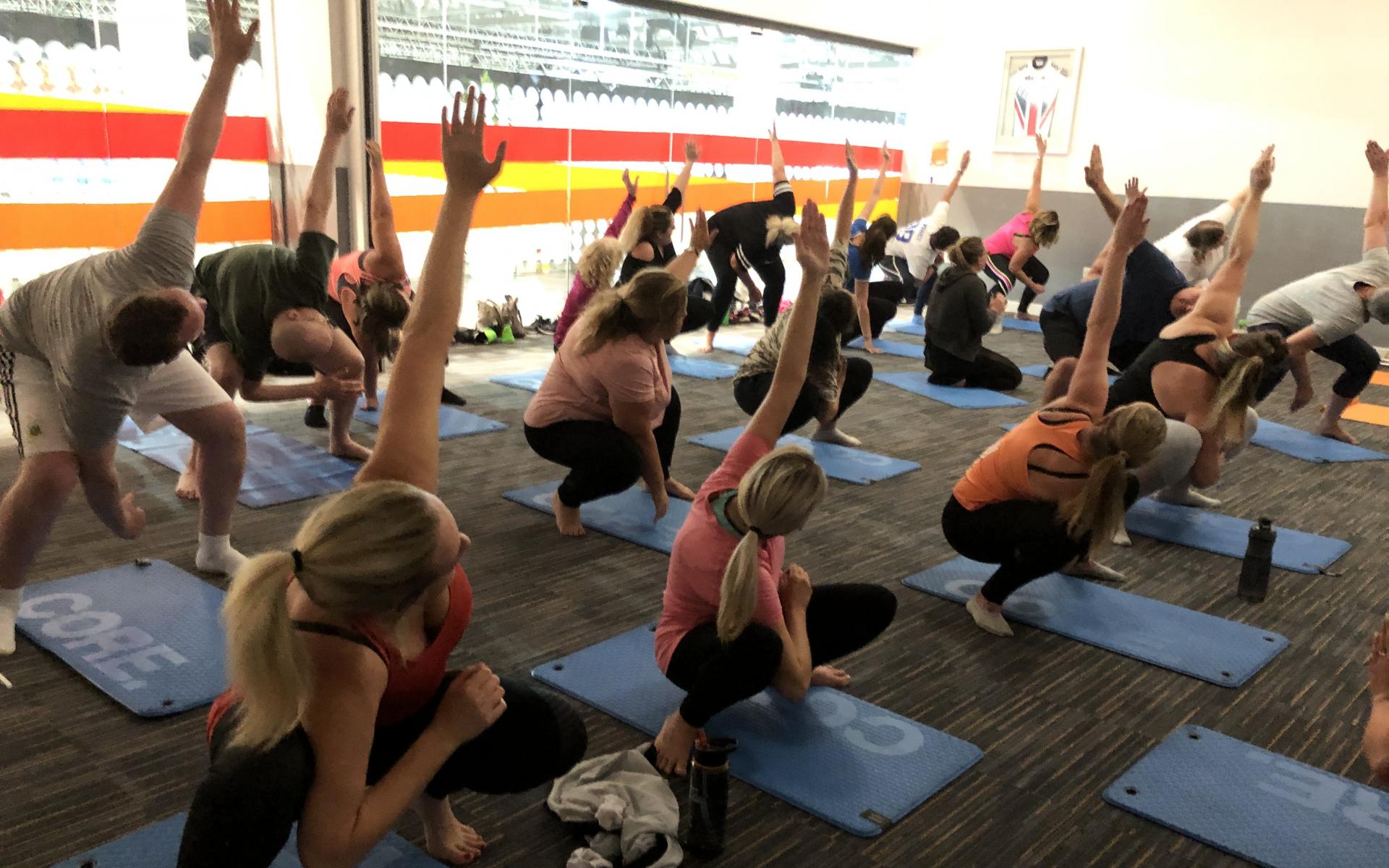 Group of women doing pilates.