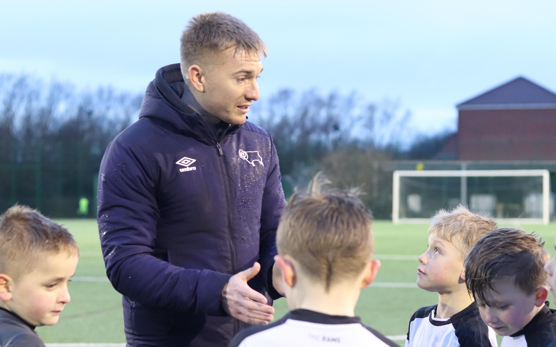 Sam Howard coaching children