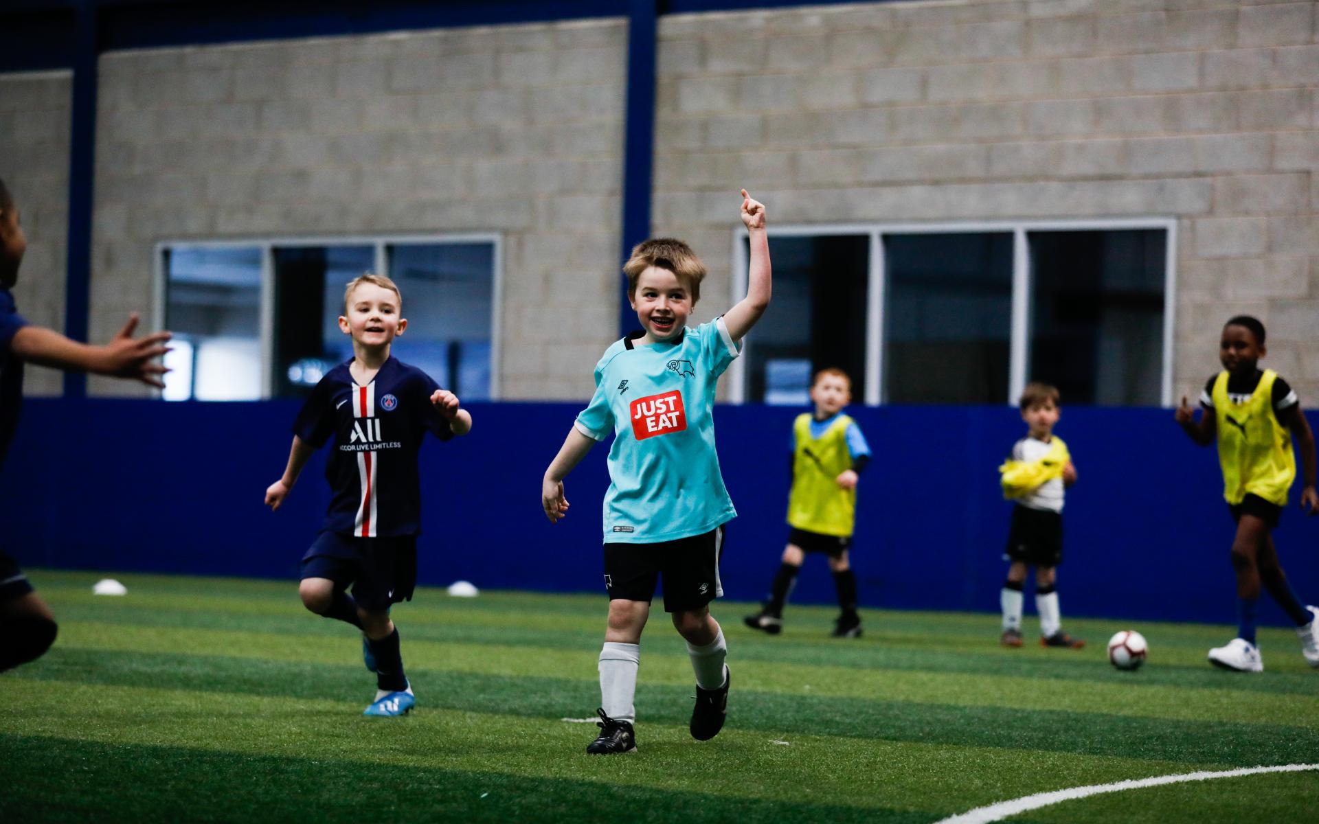 Child playing football