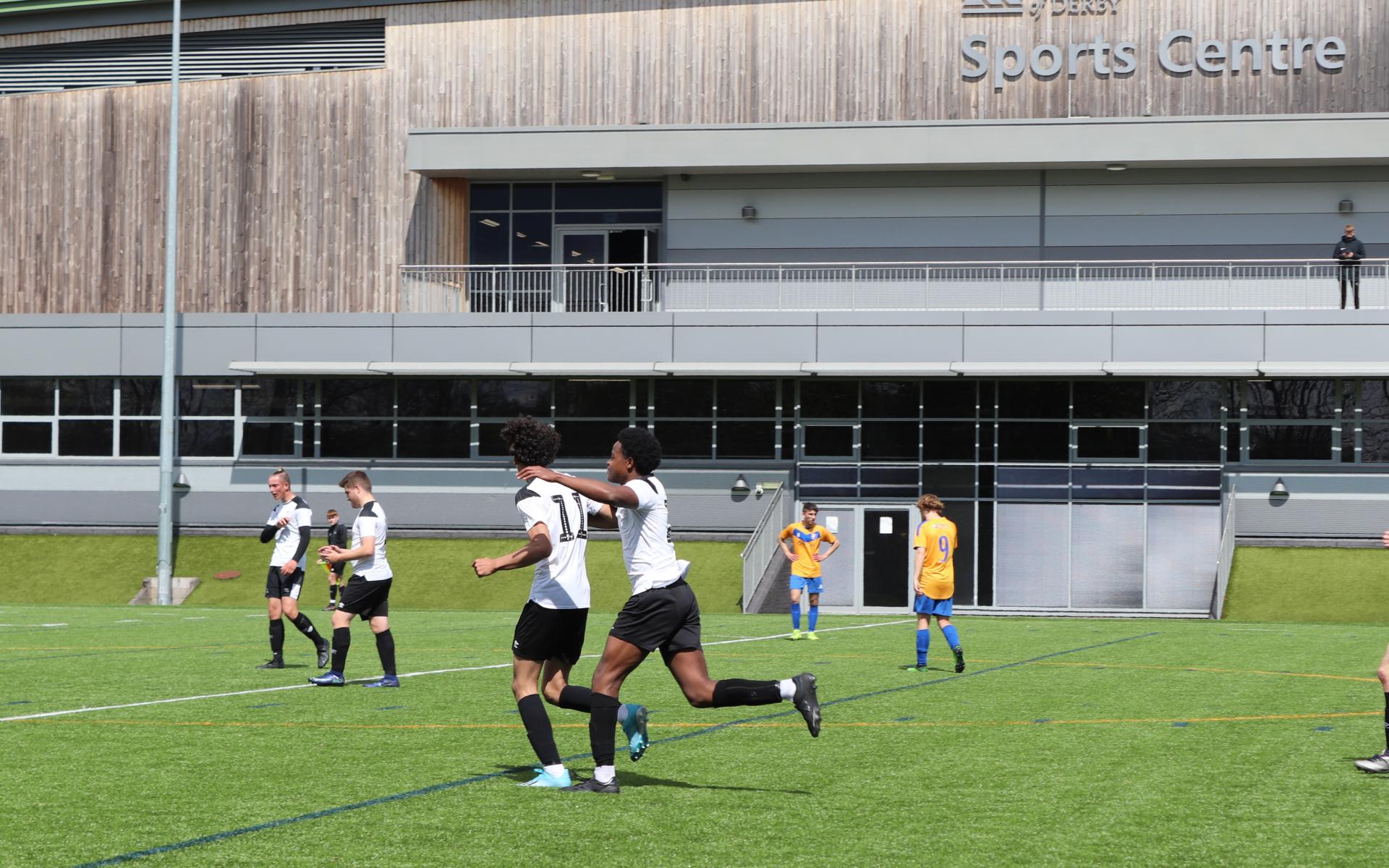 Derby's number 11 celebrates netting a late winner against Mansfield. 