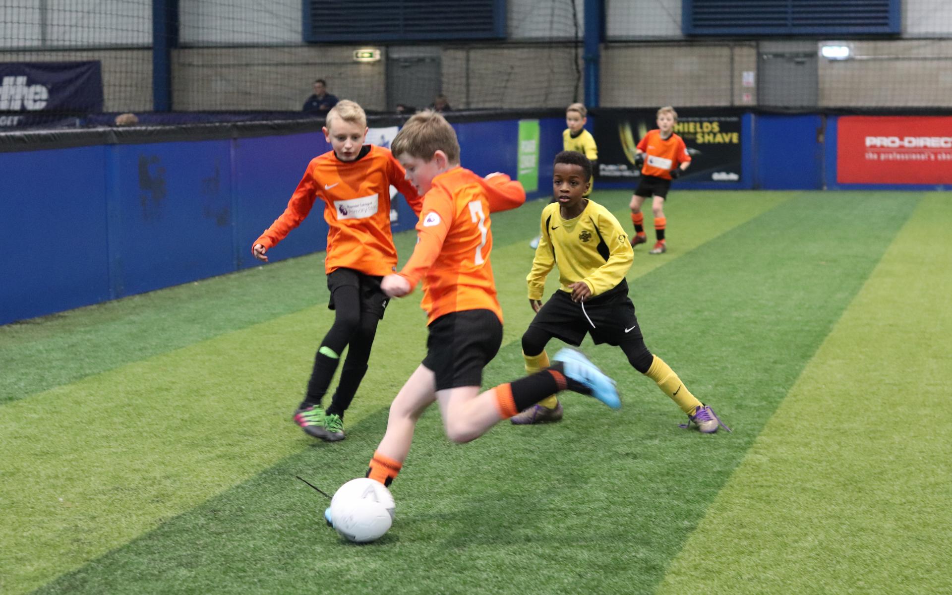 Children playing football