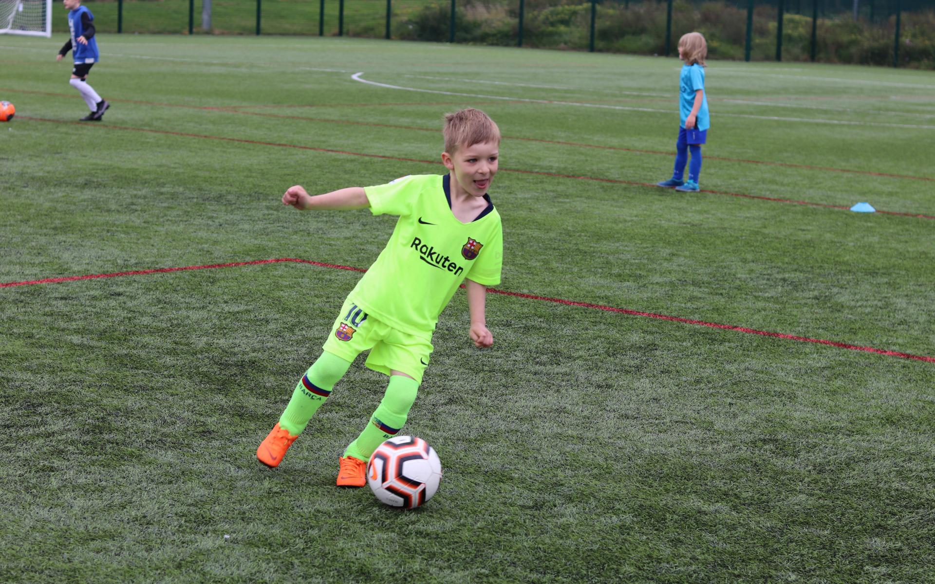 Child playing football