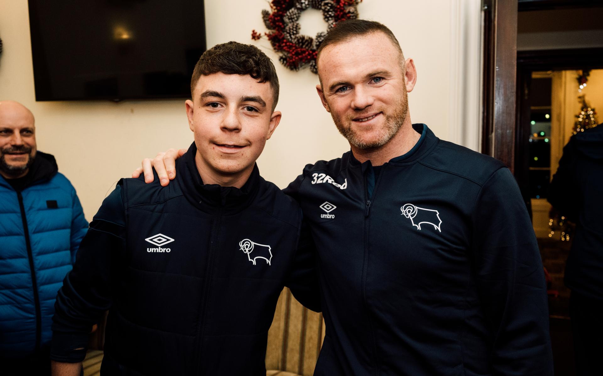 Callum with Derby County manager Wayne Rooney