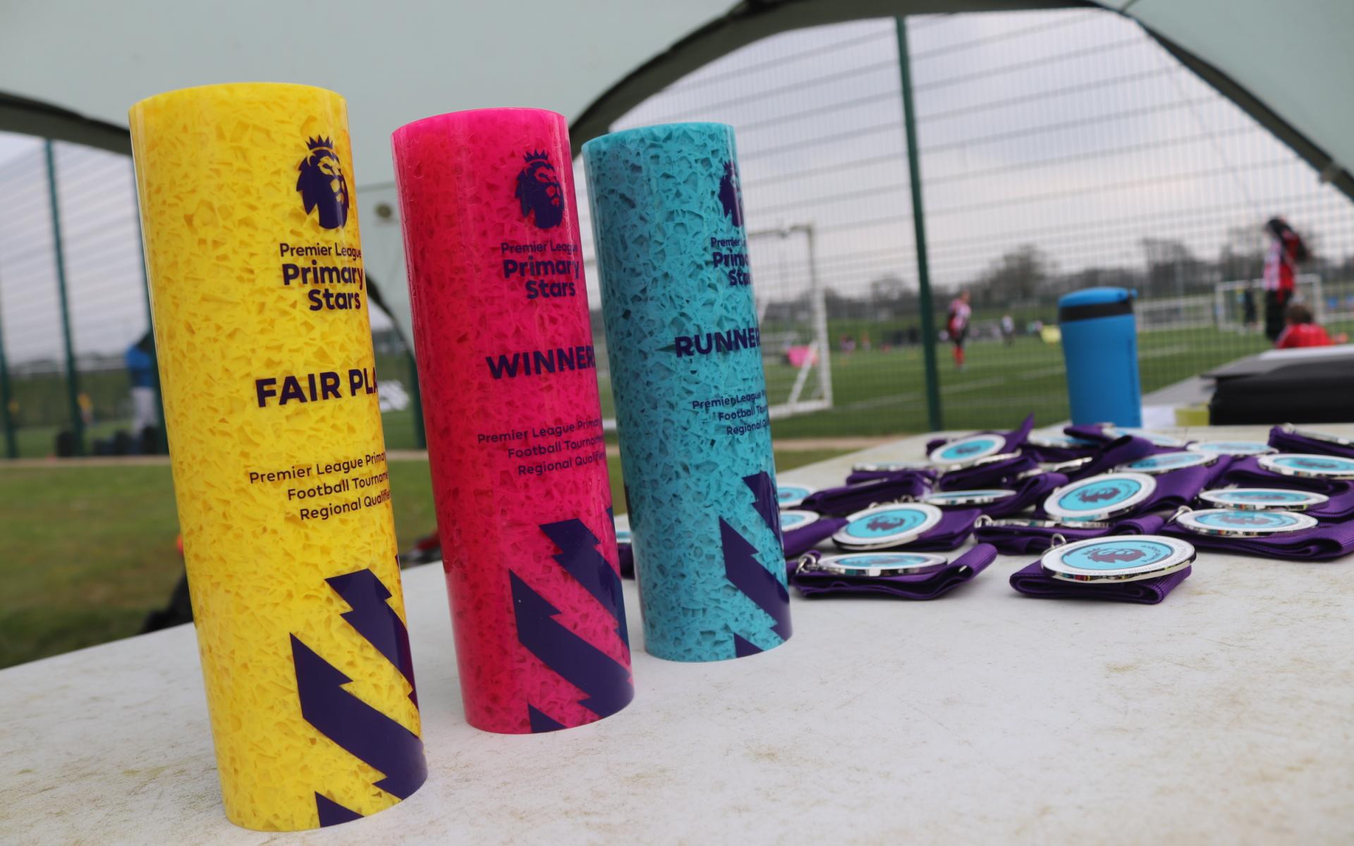 Trophies and medals from the Premier League Primary Stars Tournament