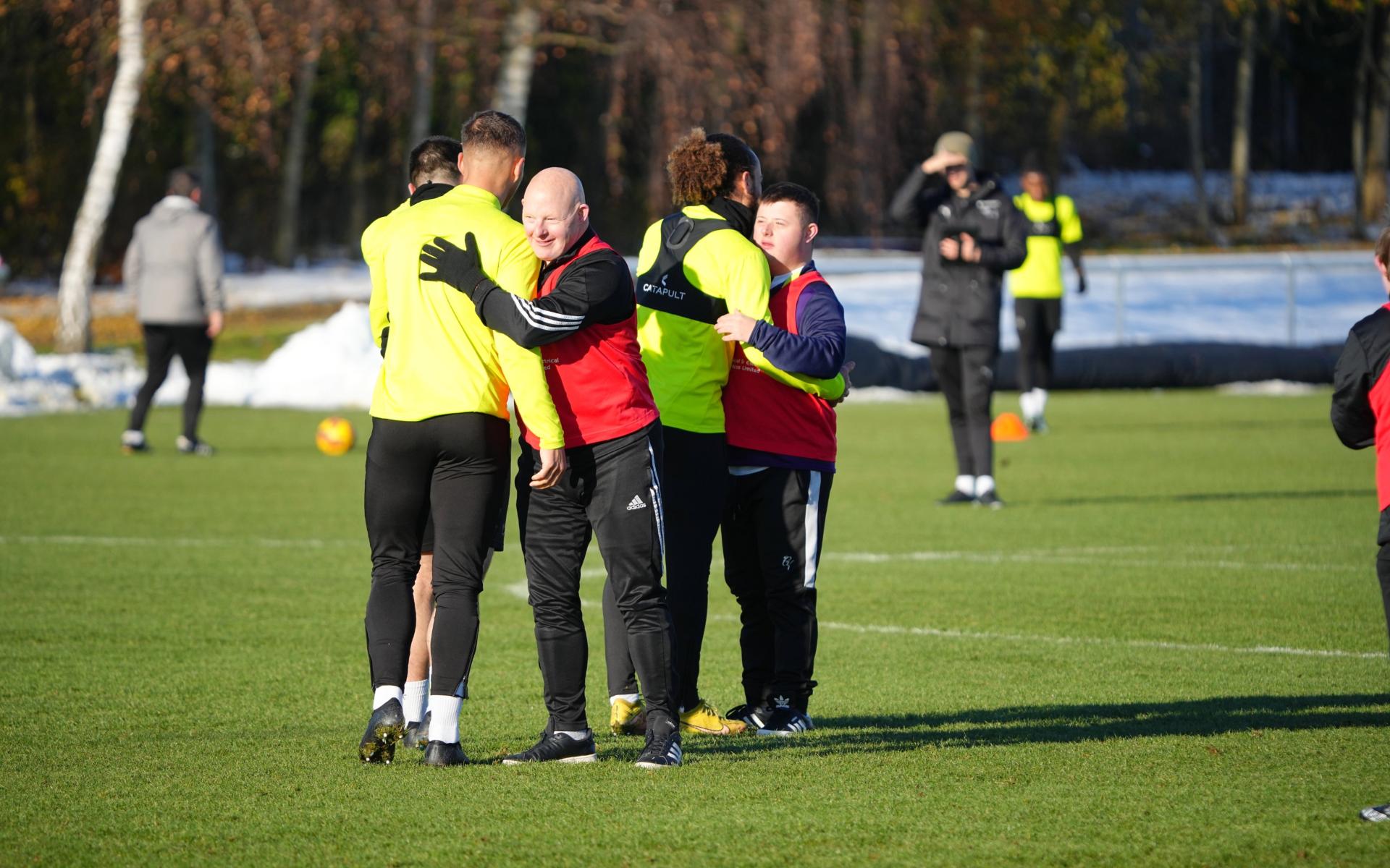 Participants hugging