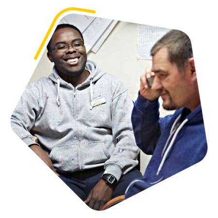 Male service user sat on the phone to family member