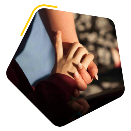 Two holding hands
