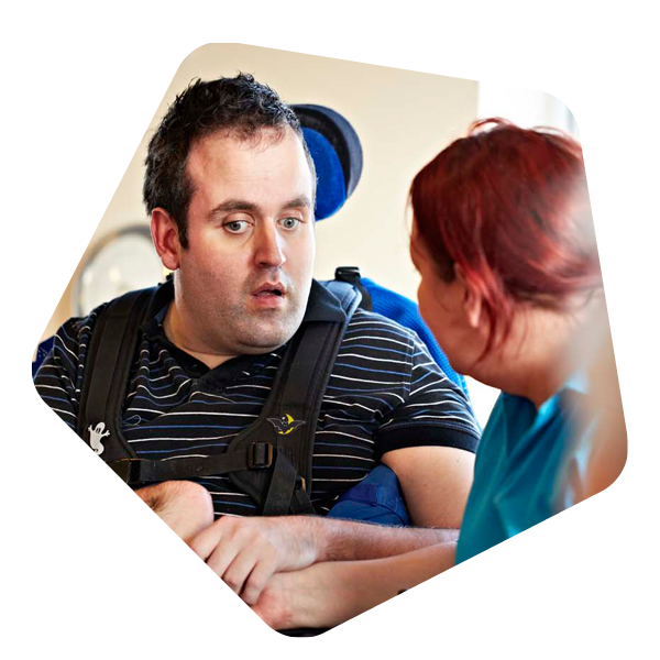 Male service user with carer