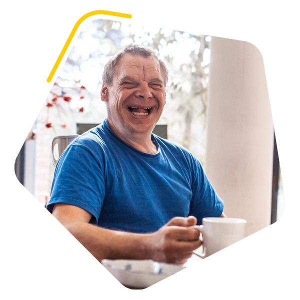 Male care home resident smiling