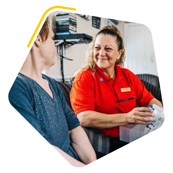 Female care worker in red t shirt