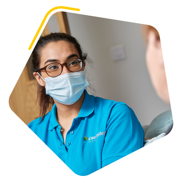 Care home resident with care worker