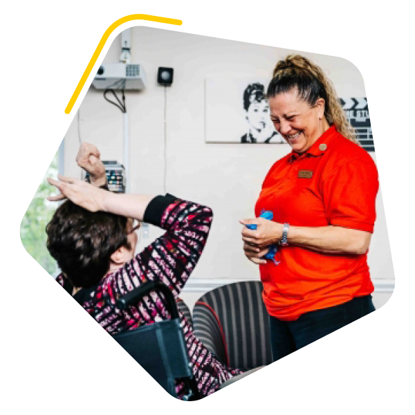 Care home resident with care worker