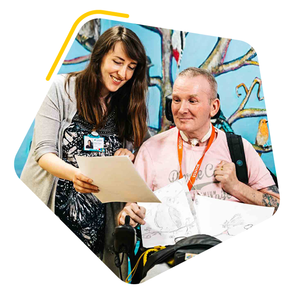 Male service user with care manager