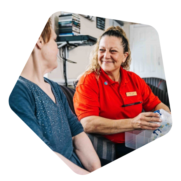 Female care worker in red t shirt