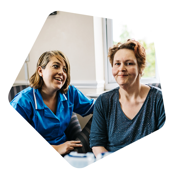 Female service user sat in chair