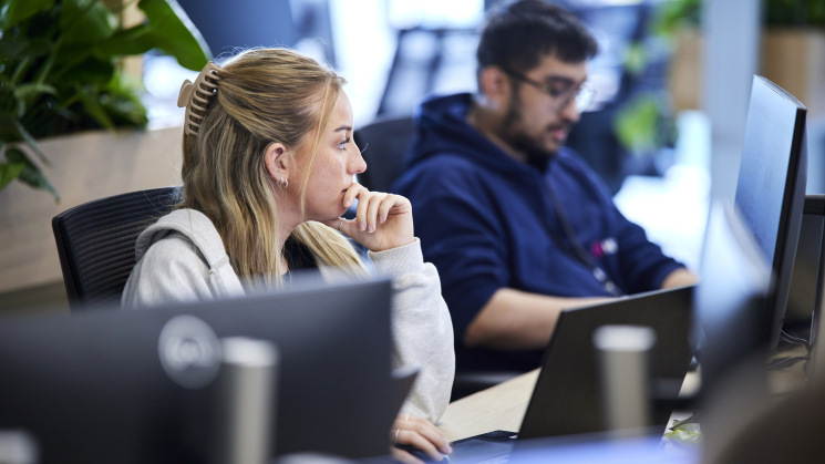 An accountant in Manchester looking at a screen