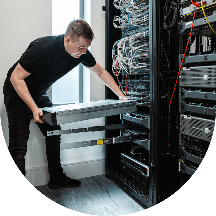 Man working in a network rack
