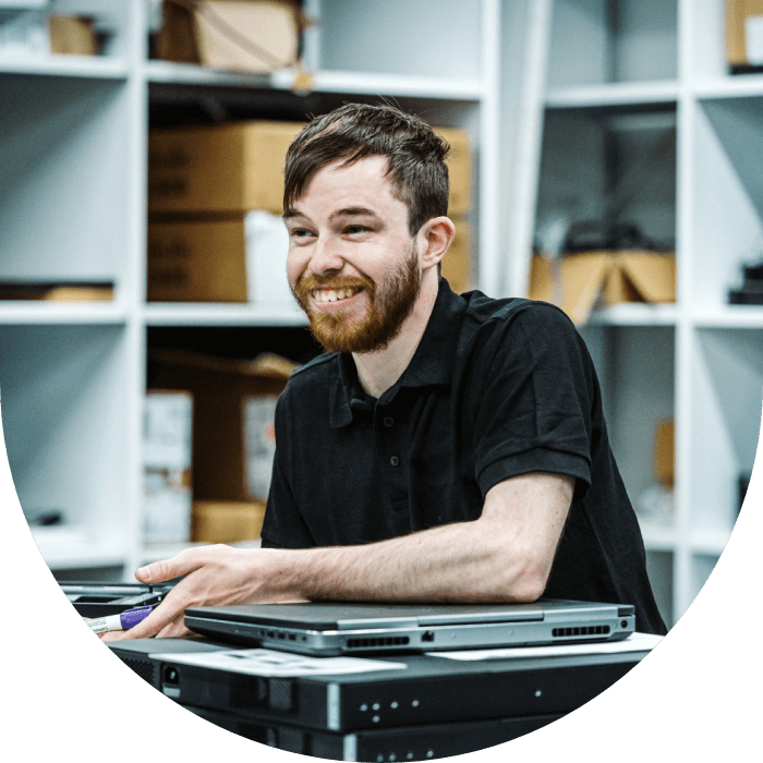 Bearded man working with laptop