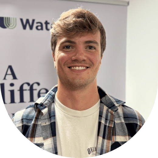 Young white male wearing a checked shirt