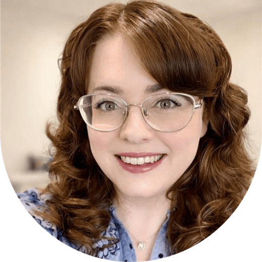 lady with brown hair and glasses