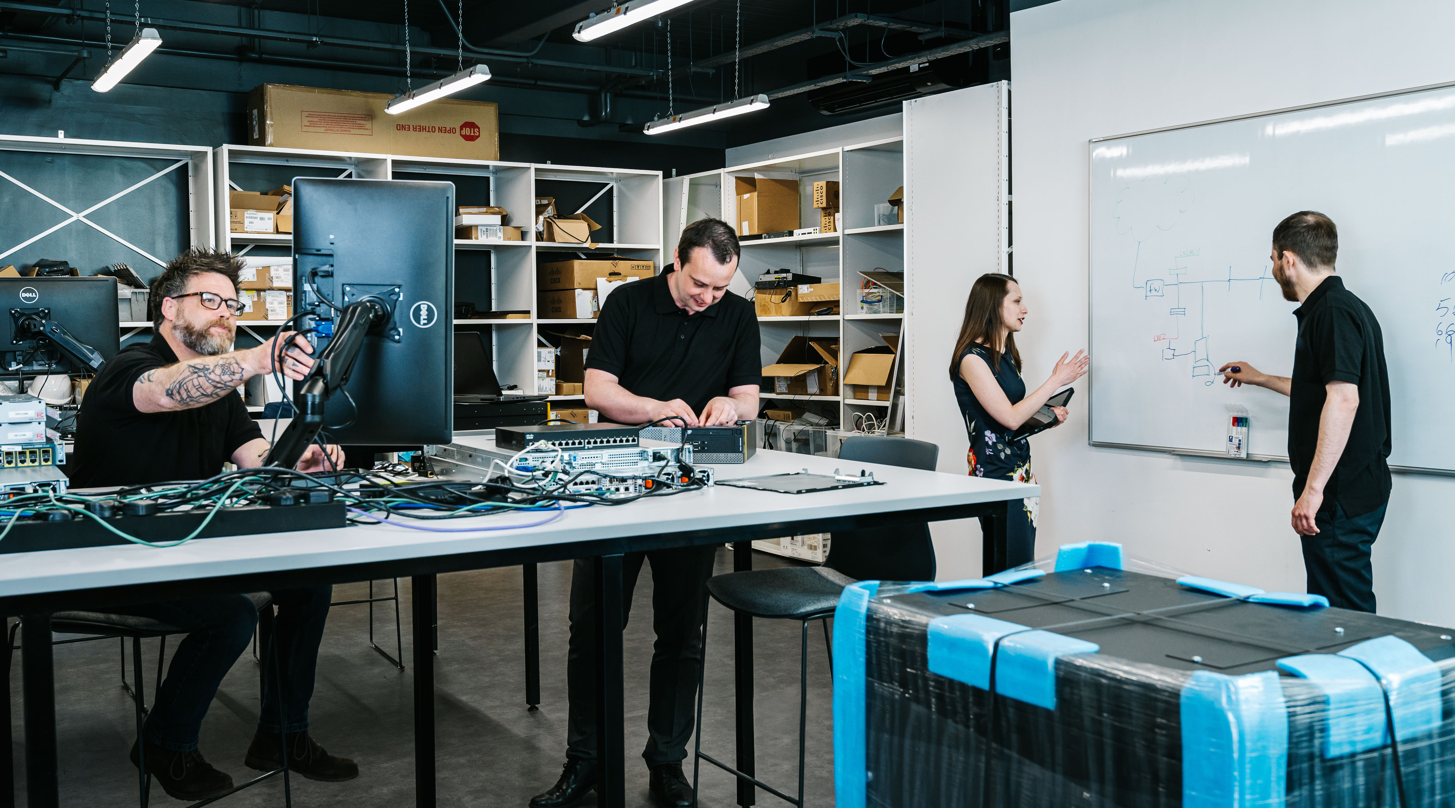 Waterston employees working at the service desk