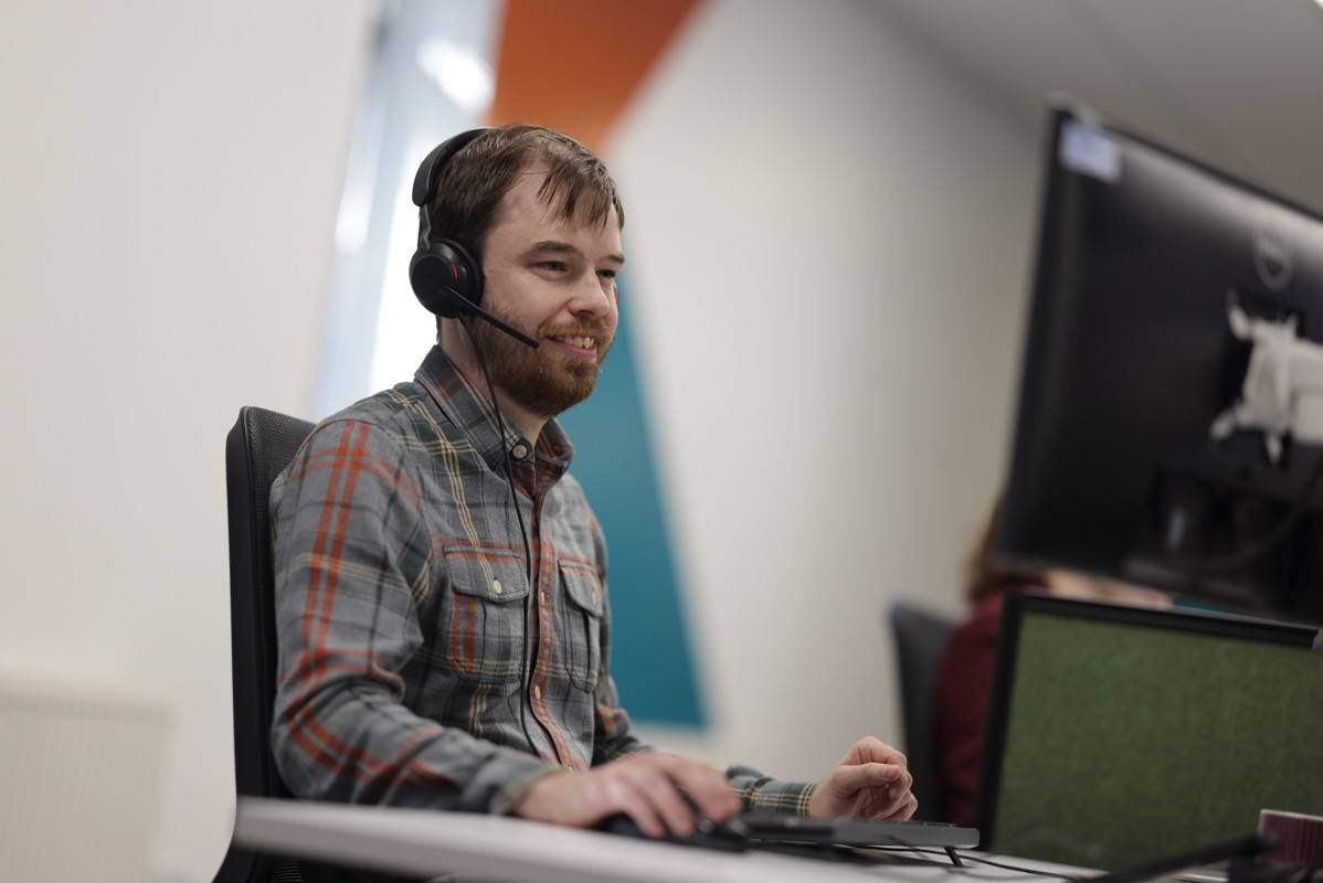 image of employee at desk
