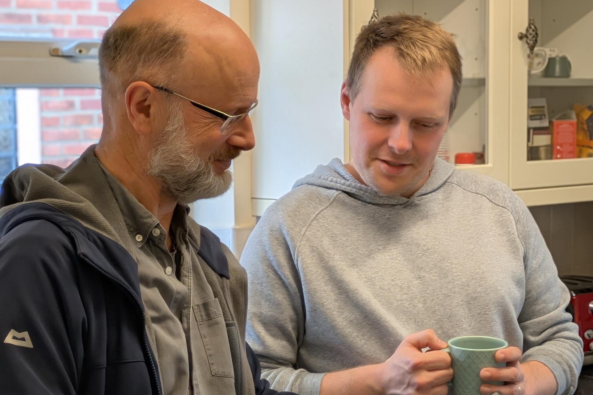 An energy advisor explaining energy bills to a customer.